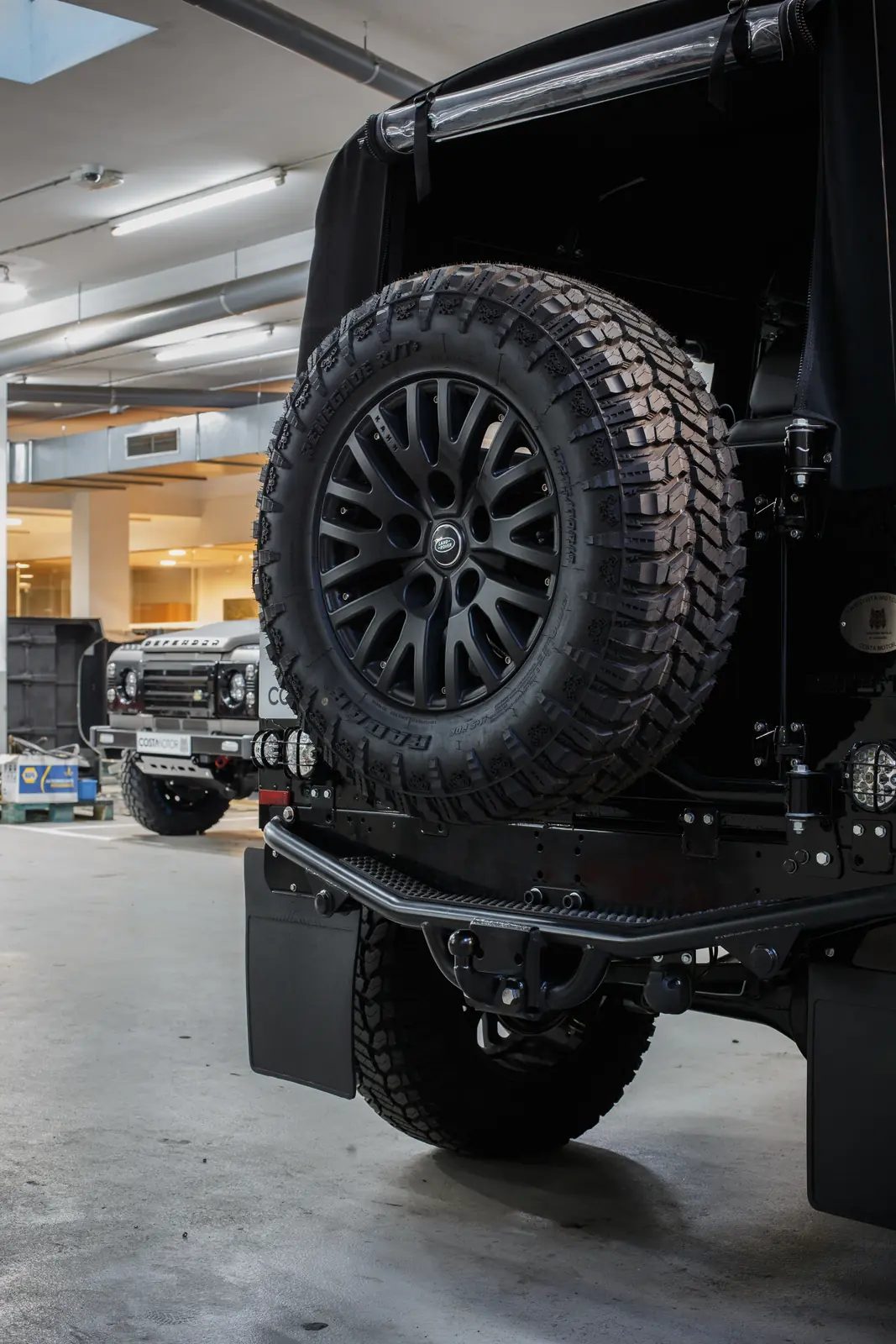 Defender 90 Apolo restored by Costa Motor — soft top open