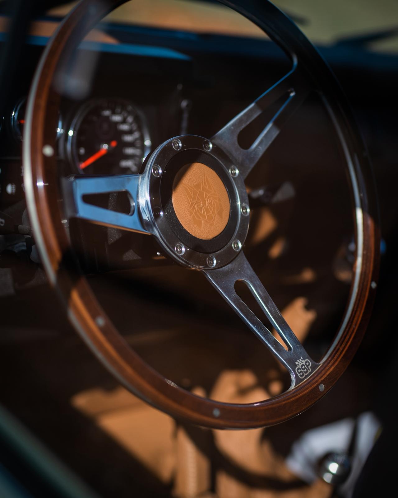Land Rover Defender Lisboa restored by Costa Motor — wood wheel