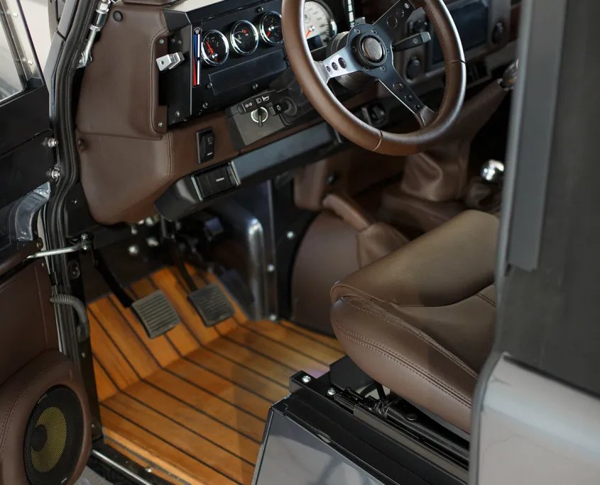 Land Rover Defender Maximus restored by Costa Motor — cockpit driver