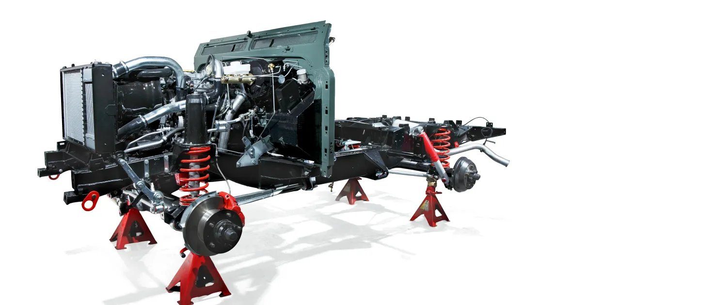 Costa Motor chassis and drivetrain assembly on stands