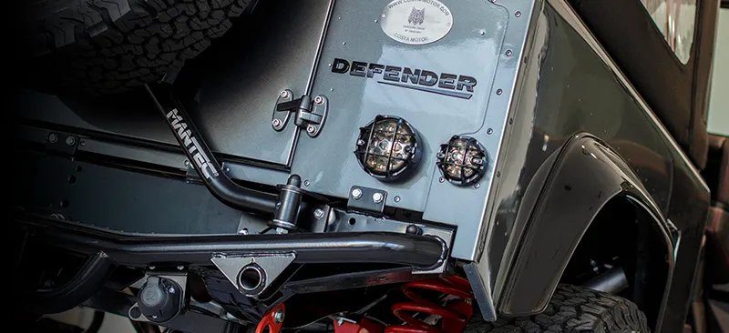 DEFENDER lettering and protective guard detail